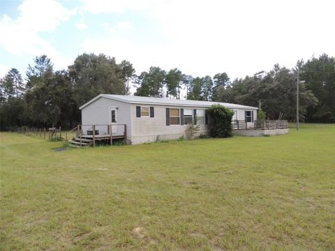 Photo of 12590 SE 58th Lane, Morriston, FL 32668 (MLS # OM708737)