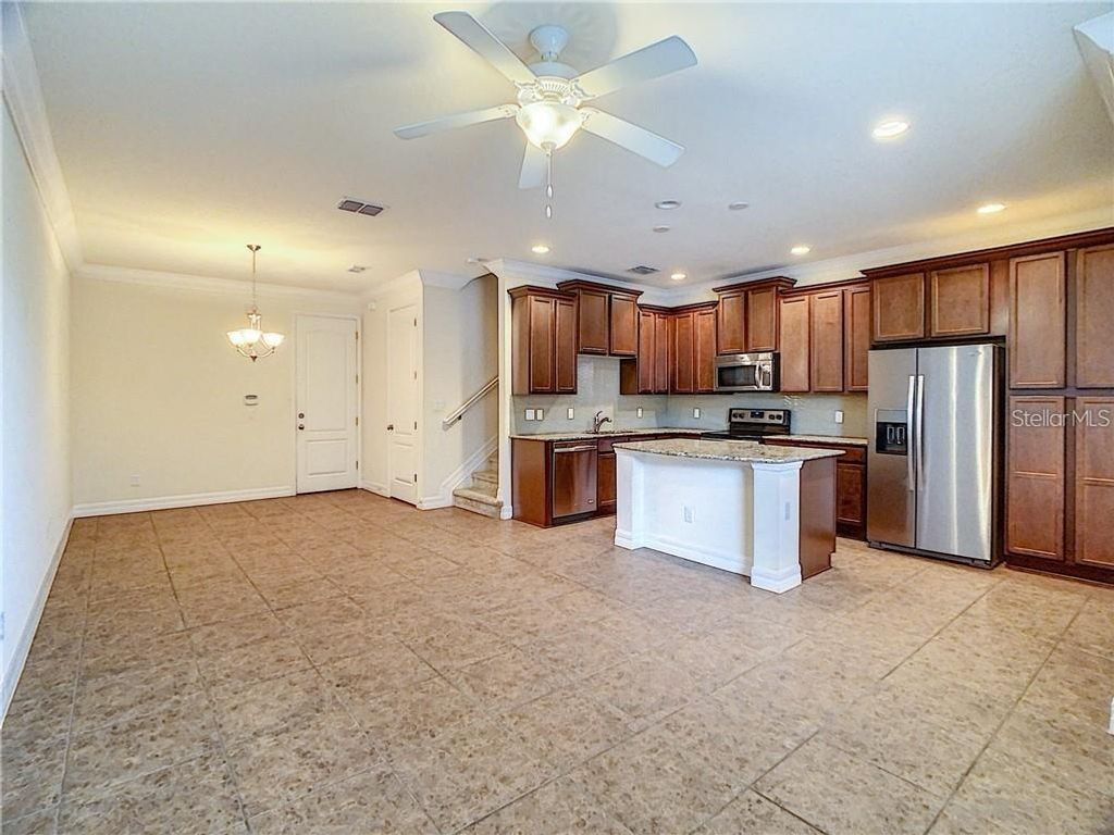 Photo of 10120 Eagle Creek Center Boulevard, Orlando, FL 32832 (MLS # S5141745)