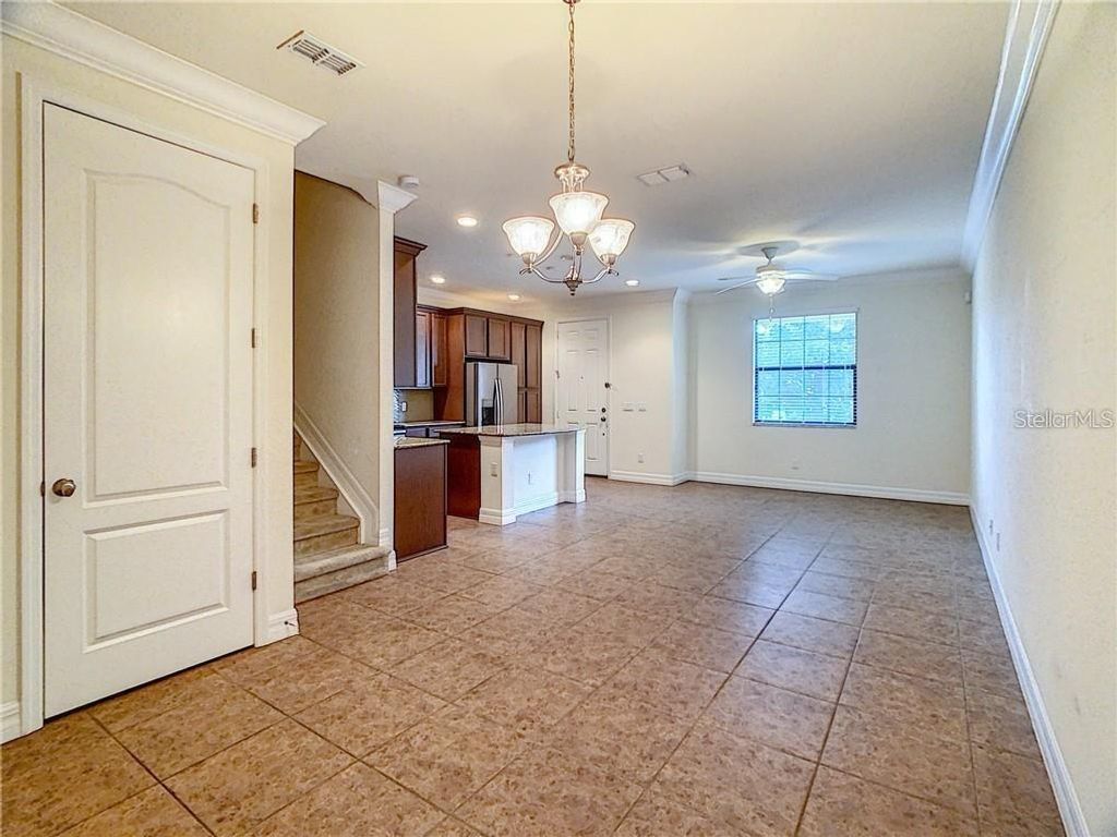 Photo of 10120 Eagle Creek Center Boulevard, Orlando, FL 32832 (MLS # S5141745)