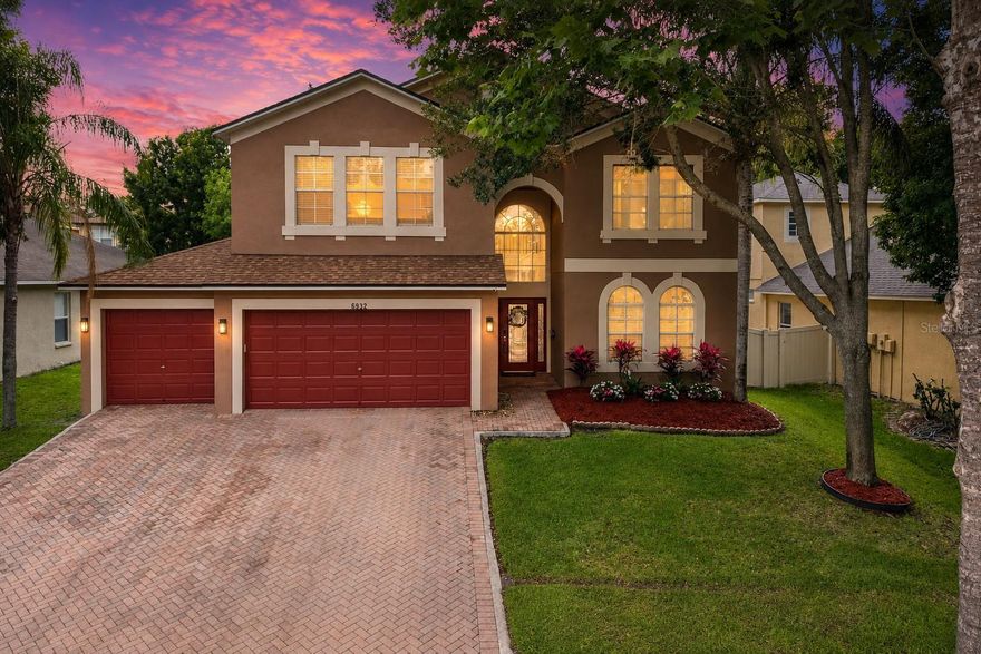 Sprawling, upgraded, and thoughtfully designed, this 3,400+ sq ft, 5-bedroom, 3-bath, 3-car garage home offers valuable updates, a movie room, and a flexible layout with expansive spaces suited for all types of families! Nestled in the centrally located, NO CDD, LOW HOA community of Boyette Oaks, and with a 2024 ROOF, 2023 WATER HEATER, and newer AC, the home welcomes you with a paver driveway, sidewalk-lined streets lined with mature trees, and lovely fresh landscaping that sets a warm first impression. Inside the two-story entryway, warm wood flooring, architectural details, crown molding, and open sightlines immediately make the home feel impressive and inviting. This is not just a new home, it is a true upgrade. Generous, freshly painted living areas flow easily between the formal living room, dedicated dining room, spacious family room with sliding glass doors to the screened patio, and the connected eat-in kitchen. Whether you are hosting guests or cooking an everyday meal, it is done here with ease. Featuring newer stainless steel appliances, granite countertops, breakfast bar seating, pantry storage, and a comfortable dinette, this kitchen is the heart of the home. The first floor also provides a convenient downstairs bedroom with an oversized walk-in closet and a nearby full bathroom with porch access, creating an ideal setup for guests, extended stays, or anyone who prefers a little extra privacy on the main level. Upstairs, the entertainer’s vibe continues with an expansive 19x17 THEATRE featuring plush carpet flooring, built-in speakers, a PROJECTOR screen, and an inviting movie-night atmosphere. Four bedrooms and two full bathrooms are also located upstairs, including the epitome of an owner’s suite. The 14x26 owner’s bedroom offers space for a sitting area, along with a massive walk-in closet and an updated ensuite bathroom with a walk-in shower, dual sinks, and a custom tiled soaking tub. It is roomy, comfortable, and designed to feel like a true retreat. Outdoors, you can relax on the screened patio and soak in the spa, step out onto the open patio for grilling or playing ball, all while enjoying the privacy of a large vinyl-fenced yard. Take a stroll down to the playground or head out of the community, just a short drive to Epperson Lagoon, Wesley Chapel shopping centers, restaurants, and major highways for an easy commute. Call today for your exclusive showing!