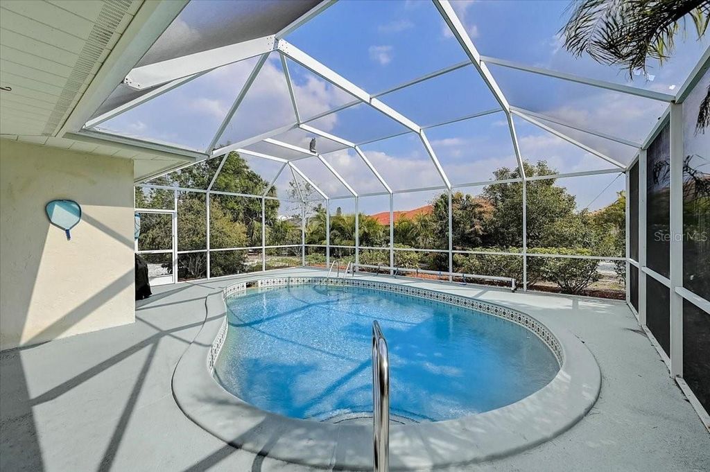 Photo of 10 Stone Mountain Boulevard, Englewood, FL 34223 (MLS # A4656653)