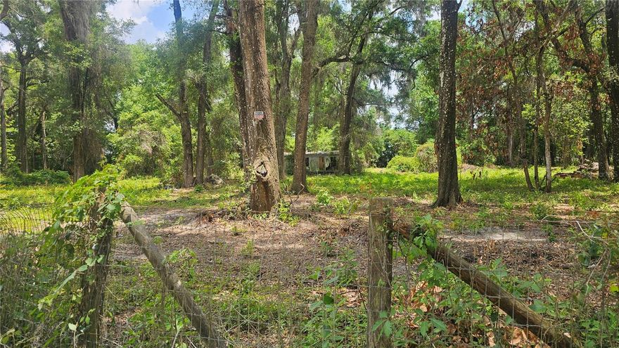 Opportunity Awaits in Summerfield – 4.1+ Fully Fenced & Cleared Acres with R4 Zoning!

Discover the endless possibilities at 17693 SE 30th Ave, Summerfield, FL — over 4.1 fully fenced, cleared acres in a prime location, zoned R4 for flexible use. Whether you’re seeking space for your own homestead, looking to develop, or planning a buy-and-hold investment, this property offers a rare combination of space, location, and potential. With existing well, power, and septic connections already in place, you have a head start on your vision. The property can be subdivided into multiple lots, giving you the option to build, sell, or rent part of the land while keeping the rest for yourself. Imagine creating your own residence on one portion while generating income from the other — the possibilities are yours to shape. A 3-bedroom, 2-bath mobile home currently sits on the property. It is uninhabitable and being sold as is, making this the perfect blank slate for your plans. Bring your creativity and take advantage of this rare land opportunity. Opportunities with this much flexibility don’t come around often!