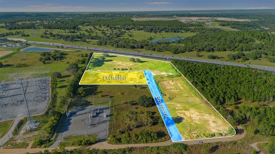 Exceptional opportunity to acquire 10.5± acres of partiatly entitled true industrial-zoned development land located directly along the Florida Turnpike in the City of Minneola, Lake County. The property is part of a larger 13-acre tract, with 2.23± acres to be sold to an existing tenant who will retain a shared driveway easement for access. The remaining 10.5± acres provide excellent visibility and immediate adjacency to the $1B+ Hills City Center mixed-use project.
Surrounding Development Includes:
Hills City Center — 1.4M SF of industrial, 600K SF retail, 500K SF medical, 1,000+ multifamily units
AdventHealth Minneola Hospital Campus — $281M+ medical development now underway
New Horizon Academy K–8, new residential communities, and over 13,000 approved housing units within 5 miles.
Property Details
Size: 10.5± acres (after subdivision)
Zoning: Industrial (City of Minneola)
Access: Shared driveway easement to tenant parcel
Utilities: City services available nearby
Frontage: Backs to Florida Turnpike with potential signage visibility
Location: Within minutes of SR 50 and US 27, with immediate Turnpike access
Highlights: Adjacent to major mixed-use and industrial expansion. Part of the high-growth Hancock Road / Turnpike corridor. Ideal for distribution, flex, or build-to-suit industrial users. Strategically positioned for Orlando MSA logistics and manufacturing connectivity. This property offers a rare chance to secure industrial land in a market poised for exponential growth, surrounded by large-scale medical, commercial, and residential investment.