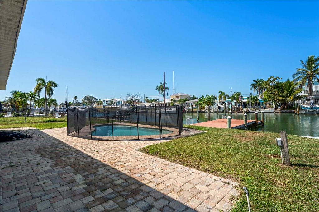 Photo of 516 Crystal Drive, Madeira Beach, FL 33708 (MLS # TB8439054)