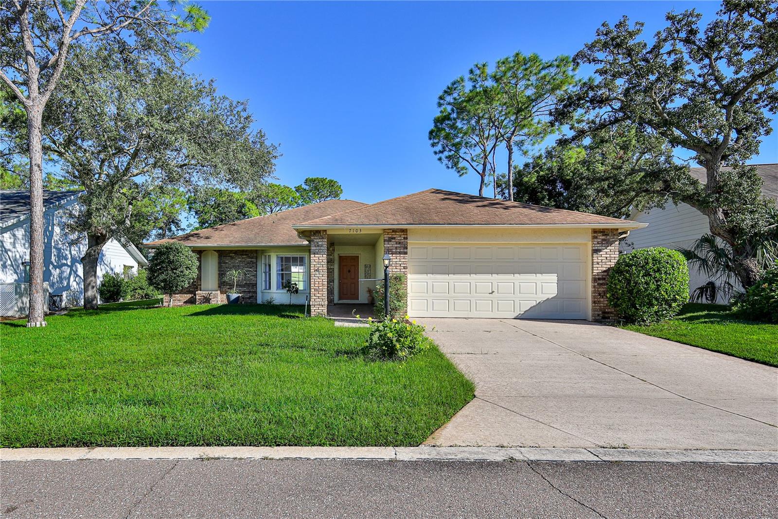 7103 CROWN OAKS DRIVE