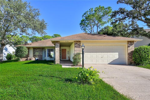 Photo of 7103 Crown Oaks Drive, Spring Hill, FL 34606 (MLS # W7890150)