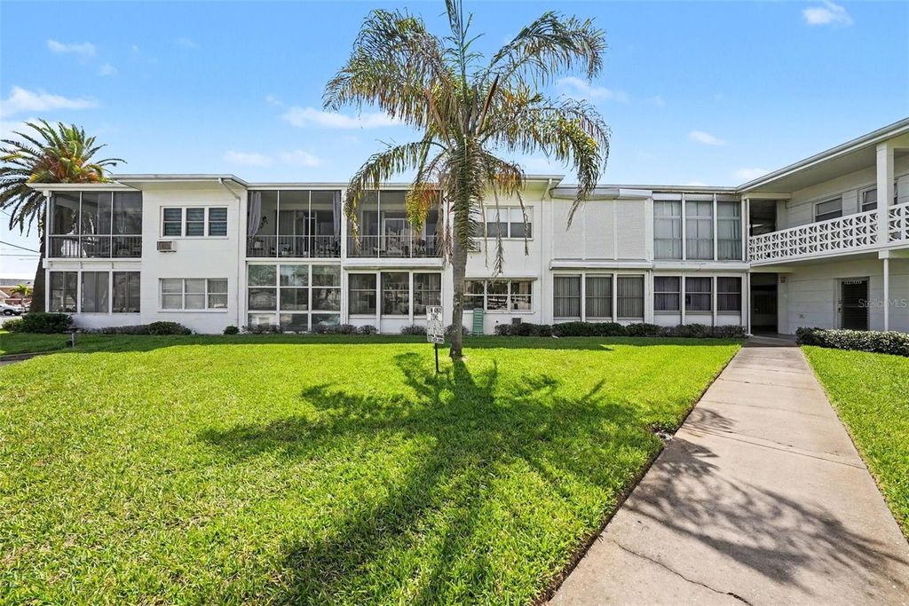 Photo of 7050 Sunset Way #11, St Pete Beach, FL 33706 (MLS # TB8513318)