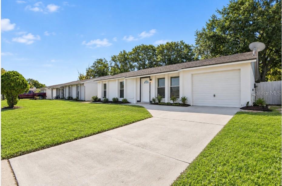 Photo of 3610 Falling Leaf Lane, Orlando, FL 32810 (MLS # O6449463)