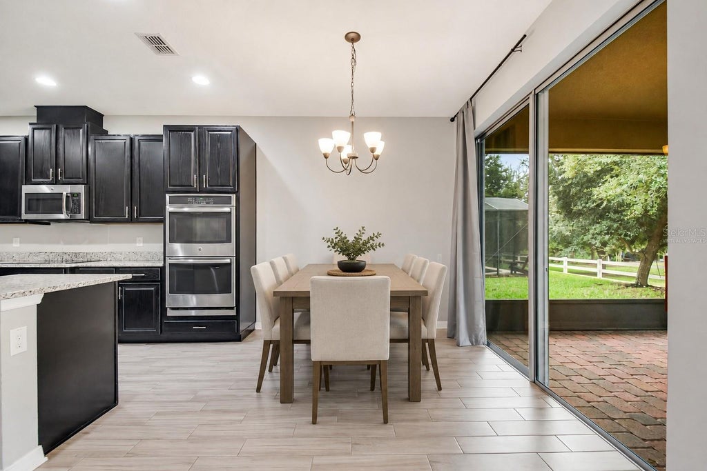 Photo of 5201 Appenine Loop E, Saint Cloud, FL 34771 (MLS # O6447644)