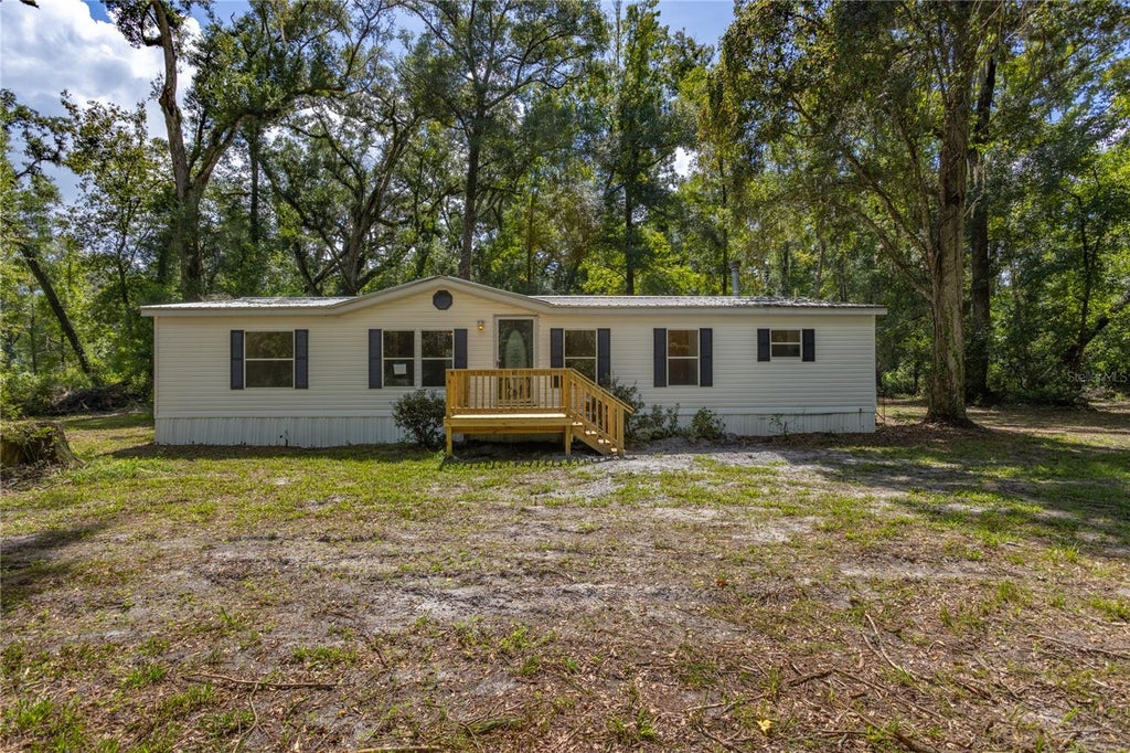 Photo of 551 NE 354th Avenue, Old Town, FL 32680 (MLS # GC544084)