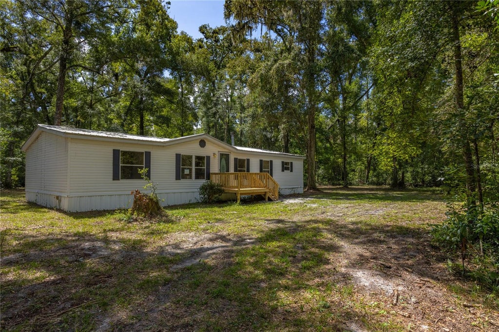 Photo of 551 NE 354th Avenue, Old Town, FL 32680 (MLS # GC544084)
