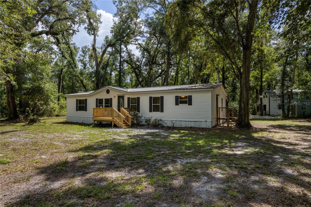 Photo of 551 NE 354th Avenue, Old Town, FL 32680 (MLS # GC544084)