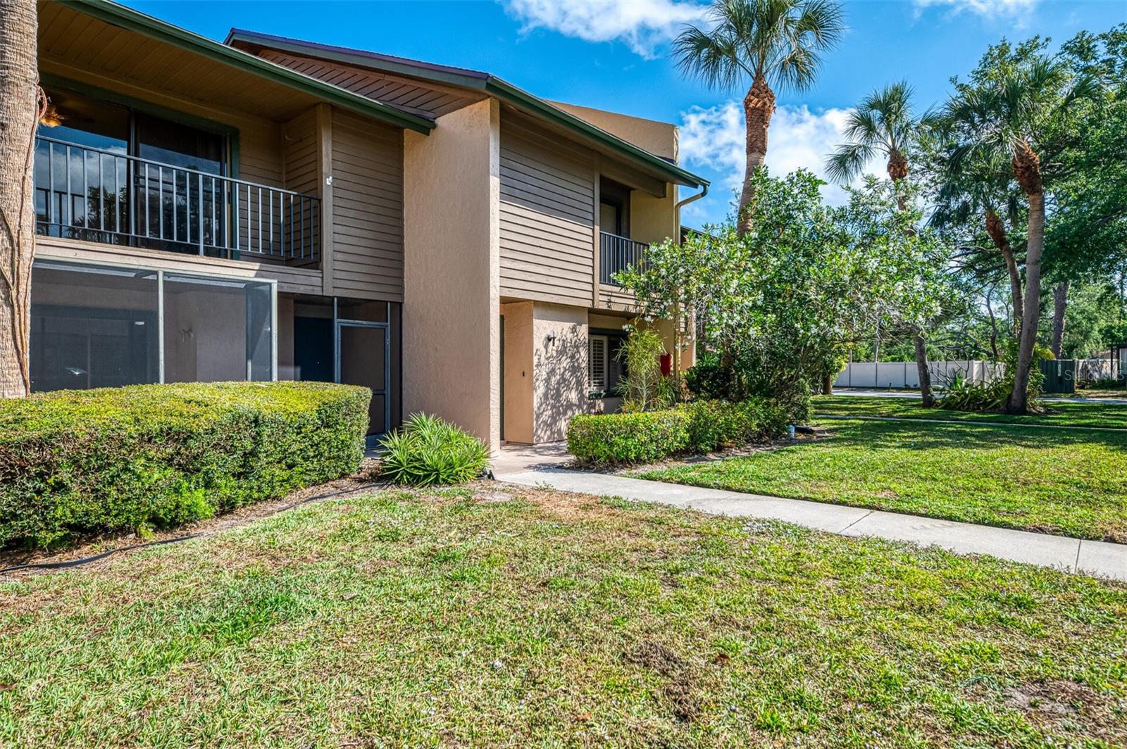 Enjoy serene pond views and sunlit living in this spacious 3-bedroom, 2.5-bath condo in the desirable Sunridge community! This bright and airy unit features a welcoming layout with generous natural light throughout. Each bedroom offers ample space and private balcony access, perfect for enjoying Florida breezes. The front lanai provides additional outdoor living space ideal for relaxing or entertaining. Overlooking a tranquil blue pond, the home offers a peaceful setting while still being close to Sarasota’s vibrant lifestyle. Enjoy access to community amenities including a sparkling pool and maintenance-free exterior and landscaping. Don't miss this rare opportunity for comfort, space, and convenience in a prime location.