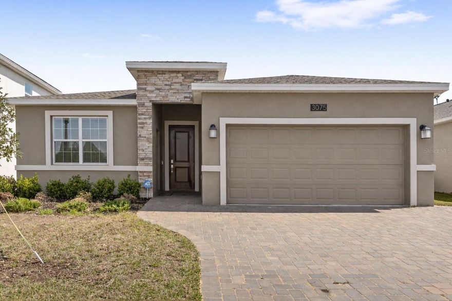 Welcome to resort-style living in the highly sought-after Providence Golf community in Davenport. This 24-hour guard-gated neighborhood is known for its exceptional amenities, beautiful surroundings, and one of the lowest HOA fees in the area.

Located in the final and most private Camden Park section, this home is tucked away on a quiet, low-traffic street toward the back of the community, offering peace, privacy, and a true neighborhood feel.
Residents of Providence enjoy an impressive lineup of amenities including two resort-style pools, one featuring a water slide, pickleball courts, a half basketball court, multiple dog parks, an on-site restaurant, and championship golf, all thoughtfully maintained and included in the HOA.
This four bedroom, three bathroom home is the highly sought after Next Gen Freedom model by Lennar, designed as a true home within a home. The main residence features three bedrooms including the primary suite, two full bathrooms, and a dedicated office, making it ideal for working from home.
The private attached suite has its own separate entrance, offers a living room, kitchenette, private laundry closet, spacious bedroom, and full bathroom. This space is perfect for multigenerational living, guests, or added flexibility.
Built with solid block construction and just over three years old, this home combines modern efficiency with peace of mind. The fully fenced backyard, screened-in lanai, and extended driveway that accommodates up to three vehicles, in addition to the two-car garage, complete this exceptional property.
Privacy, flexibility, and resort-style amenities make this home truly stand out.