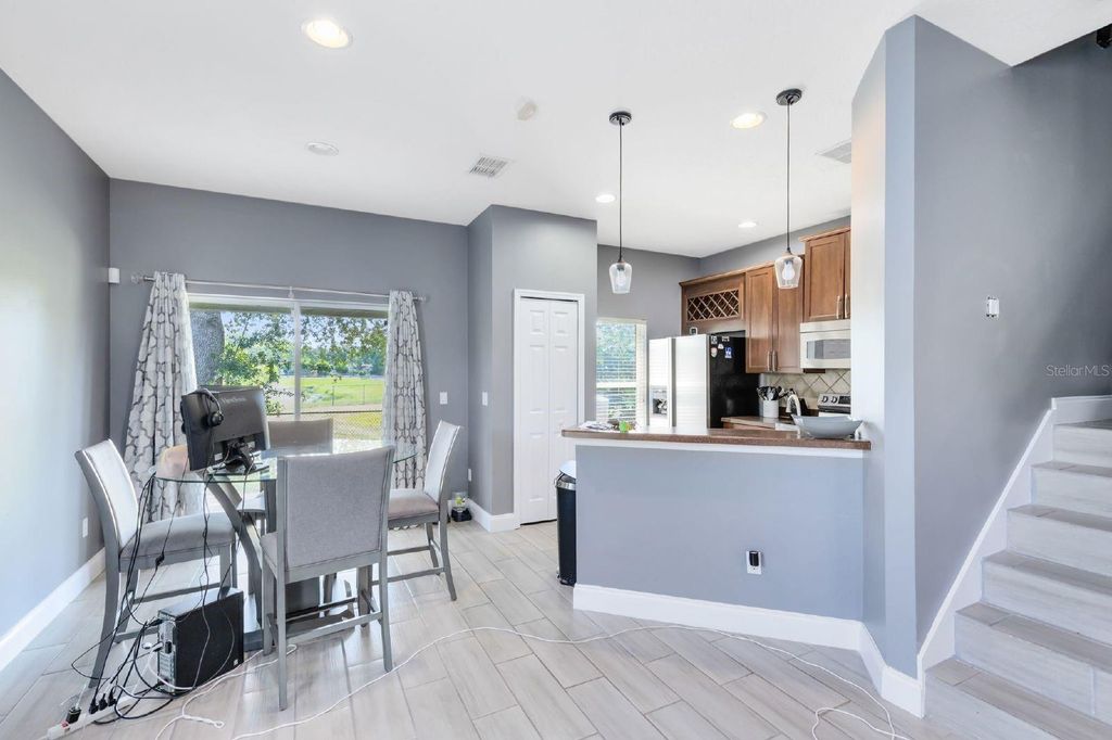 Photo of 3891 Clubside Pointe Drive, Orlando, FL 32810 (MLS # O6367422)