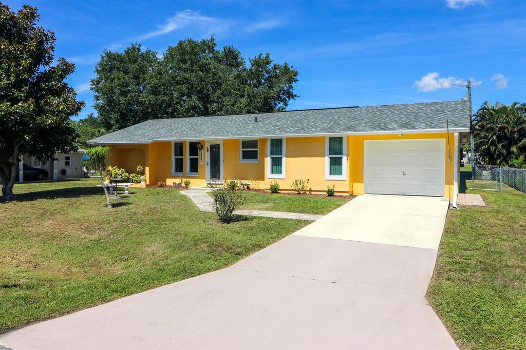 Photo of 582 Ridgewood Street NW, Port Charlotte, FL 33952 (MLS # W7885758)