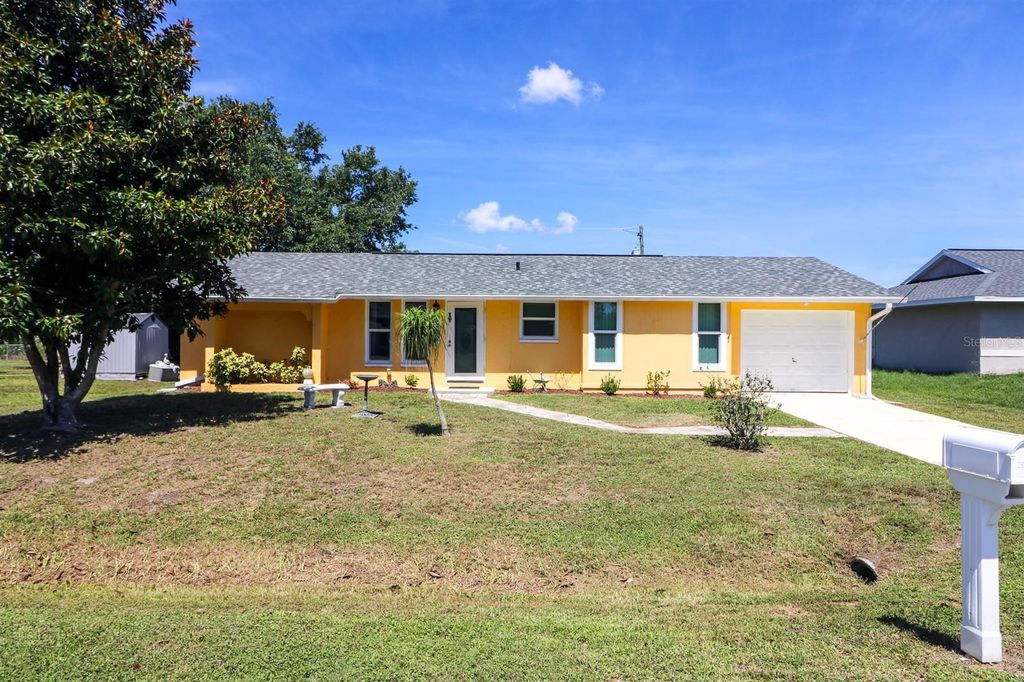Photo of 582 Ridgewood Street NW, Port Charlotte, FL 33952 (MLS # W7885758)