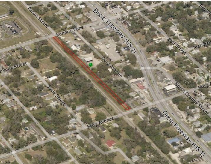 Long, narrow parcel of land just east of the railroad tracks. Parcel Runs from Ronnoc Lane south to Mary Avenue.