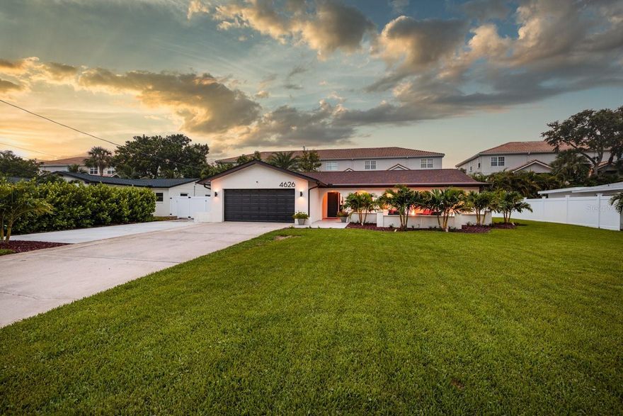 Welcome to a truly stunning five-bedroom, two-bath, two-car garage residence positioned along one of the most iconic and highly coveted streets in Northeast St. Petersburg—distinguished Bayshore Boulevard Northeast. This extensively upgraded home delivers an exceptional combination of modern sophistication, high-end improvements, and resort-style outdoor living in one of the city’s most desirable waterfront-adjacent neighborhoods.
Thoughtfully enhanced with quality craftsmanship and attention to detail, the home features a new roof installed in January 2022, impact-rated sliding glass doors valued at approximately $30,000, and updated windows that promote energy efficiency, safety, and comfort. Inside, the beautifully redesigned kitchen serves as the centerpiece of the home, showcasing sleek quartz countertops, stainless steel appliances, and a spacious center island—perfect for entertaining guests or enjoying casual meals. The flexible five-bedroom layout provides abundant living space ideal for families, guests, remote work, or hobby areas, all complemented by bright interiors and a welcoming ambiance.
The backyard has been transformed into a private retreat featuring a spectacular saltwater swimming pool valued at over $85,000, complete with a dramatic waterfall feature, sun shelf, PebbleTec finish, and Pentair multicolor LED lighting that creates a captivating atmosphere in the evening hours. Elegant shell stone pavers installed in a timeless herringbone pattern surround the pool, elevating both beauty and functionality for outdoor gatherings and relaxation.
The exterior grounds have been professionally curated with lush landscaping, including new St. Augustine sod, seven stately Christmas palms gracing the front yard, and fourteen palms lining the rear boundary, creating a tropical and private setting. Irrigation is managed by a five-zone Rain Bird system controlled remotely via smartphone and supplied with reclaimed water for efficiency. A new vinyl privacy fence with oversized gates provides convenient access for boat, RV, or trailer storage, while an additional concrete parking pad adjacent to the garage expands parking flexibility. Seamless gutters with underground drainage have also been installed to enhance long-term durability.
Significant mechanical upgrades further elevate the home’s value, including a new York high-efficiency HVAC system featuring updated ductwork, advanced inverter technology, enhanced insulation, and a smart thermostat for precise climate control. A new water heater installed in 2022 adds additional reliability and efficiency.
This prime location places you just a short 10-minute bike ride to vibrant Downtown St. Petersburg, where you can enjoy award-winning dining, boutique shopping, waterfront parks, cultural venues, and year-round events. The property is also approximately 20 minutes from the Gulf beaches and offers quick connectivity to Interstate 275, the scenic Sunshine Skyway Bridge, and surrounding destinations including Tampa and Sarasota. Nearby amenities include recreation and wellness opportunities at the YMCA of Greater St. Petersburg, along with picturesque waterfront paths and neighborhood charm throughout Northeast St. Pete.
This exceptional property presents a rare opportunity to own a meticulously upgraded home in a premier location known for its beauty, convenience, and lifestyle appeal. Schedule your private tour today!