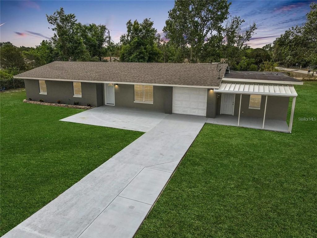 Photo of 11548 Missouri Street, Leesburg, FL 34788 (MLS # O6376629)