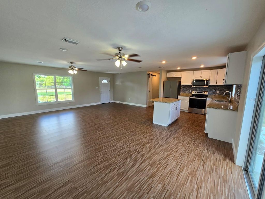 Photo of 11548 Missouri Street, Leesburg, FL 34788 (MLS # O6376629)
