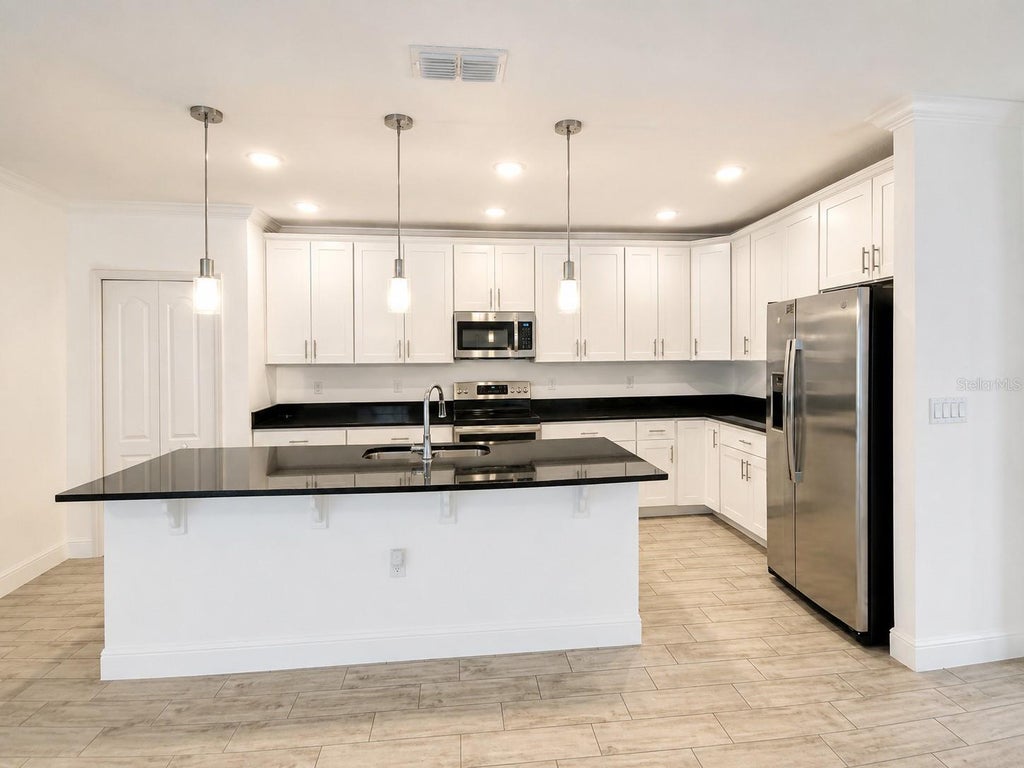 Photo of 410 Taft Drive, Davenport, FL 33837 (MLS # S5156082)