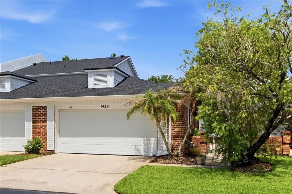 Photo of 1429 S Chickasaw Trail #7, Orlando, FL 32825 (MLS # O6405968)