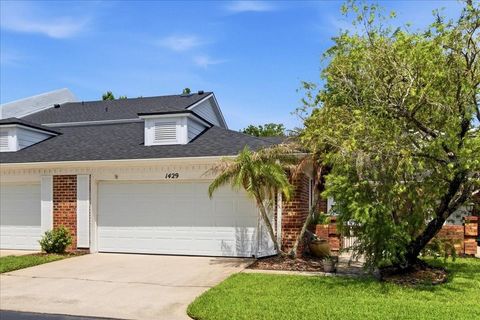 Photo of 1429 S Chickasaw Trail #7, Orlando, FL 32825 (MLS # O6405968)