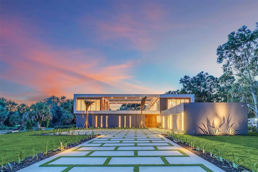 Under contract-accepting backup offers. -Accepting BACK UP OFFERS---BRAND NEW ULTRA MODERN "Parade of Homes 2023 Winner" with Lake views in Windermere. One-of-a-kind Style!! This is the kind of home you do not get to see that often. The kind of home most people only get to see in magazines!! For the most discerning of buyers wanting, it all. This sophisticated 7700 plus square feet of indoor space and over 10,000 sq ft including the outdoor areas. This ASTONISHING! 7 bedroom 8 and a Half bath home captures the beauty of Florida living with its lake views from your second-floor outdoor terrace. The sleek design includes a massive driveway that can fit all your guest and a Four car garage plus an extra storage room. Your home also comes with Control 4 Automation Smart Home package.  
Imagine walking through your large, custom double entry doors, you will be immersed in the open concept indoor/outdoor living. The large, sliding doors and oversized glass hurricane rated windows allows you to connect your spacious interior with your stunning outdoor living spaces. Your outdoor living space includes a grand summer kitchen, oversized pool deck, full outdoor bath with shower, and pool and spa, not to mention your own SAUNA. YES !! your very own sauna. 
Your gourmet kitchen with Top-of-the-Line wi-fi enabled appliances, and unique high-end fixtures is the perfect spot for entertainment. The main floor also features a secondary master bedroom suite. The main floor has a private garden (coming soon) and a GYM! Plus, your living spaces are all designed to connect to the splendor of your outdoor spaces. The second floor features a secondary living room/loft area with contemporary glass railings, allowing you to enjoy the natural light connecting you to a second-floor outdoor terrace just perfect for another area to entertain and party the night away! Your second-floor terrace overlooks amazing Lake Views of “Lake Butler” and views of your delightful all handcrafted tiled pool and spa area with automated lighting.  Walking across your terrace is the In-law suite or can be used as an office or flex room with its own walk in closet and full bath.  Going back into the main home, the Main Master bedroom with an abundant walk-in closet and lavishly done Master bath, as well as two ensuite secondary bedrooms and a large laundry room complete this spectacular Windermere Florida home. All bedrooms have walk-in closets with custom closet organizers and their own mini master baths. From Top to Bottom, every inch of your home is filled with unique, chic modern details that truly make this a one-of-a-kind home! Come find your dream home in Windermere, conveniently located close to shopping and restaurants, and minutes to Windermere Prep. You must see this home to feel its energy ambiance and appreciate its gorgeousness. Call today for a private tour and make this Unique Beautiful home yours!!
See all the pictures and media videos here https://tinyurl.com/modernwindermere