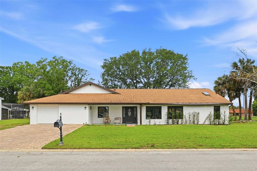 Exquisite Fully Renovated Golf-Front Residence in the Heart of Dr. Phillips

Presenting a rare opportunity to own a completely reimagined 3-bedroom, 2.5-bathroom residence offering approximately 2,200 square feet of refined, modern living within the prestigious Orange Tree Golf Community. This exceptional home has undergone a full-scale renovation, thoughtfully redesigned with a focus on quality, functionality, and timeless contemporary elegance.

Every major system has been replaced, including new A/C, plumbing, and electrical, ensuring both comfort and long-term peace of mind. The interior showcases a seamless open-concept layout enhanced by expansive sight-lines, abundant natural light, large-format porcelain tile flooring, smooth wall finishes, and integrated recessed lighting throughout.
At the heart of the home, a sophisticated chef’s kitchen has been meticulously designed with a striking waterfall-edge quartz island, custom European-style cabinetry, premium stainless steel appliances, built-in oven and microwave, and designer fixtures. The space flows effortlessly into the main living and dining areas, anchored by a bespoke architectural feature wall with vertical wood detailing and a floating media installation, creating a warm yet modern focal point ideal for both everyday living and entertaining.

Floor-to-ceiling sliding glass doors open to an expansive covered lanai and fully screened pool area, offering a seamless indoor-outdoor experience. Overlooking the lush fairways of the 8th hole of the Orange Tree golf course, the outdoor setting provides exceptional privacy and tranquil views perfect for enjoying Florida’s year-round lifestyle. 

The primary suite is a serene retreat, complemented by a custom-designed walk-in closet with built-in storage. Additional bedrooms are well-appointed, maintaining the same level of finish and attention to detail throughout the home.

Situated within the sought after Orange Tree Golf Community, residents enjoy a wealth of amenities including a beautifully maintained golf course, tennis courts, community pool, clubhouse, recreational areas, and scenic green spaces.

Ideally located in Dr. Phillips, just moments from the renowned Restaurant Row, offering world-class dining and entertainment. Convenient access to I-4, Florida’s Turnpike, and major thoroughfares provides effortless connectivity to Downtown Orlando, Orlando International Airport, and Central Florida’s premier attractions, including Walt Disney World and Universal Orlando. 

Zoned for highly rated schools.
This is a truly turnkey residence where modern design meets everyday luxury in one of Orlando’s most sought-after communities.

Private showings available by appointment.