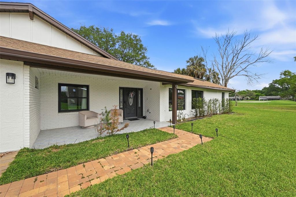 Photo of 6747 Edgeworth Dr, Orlando, FL 32819 (MLS # O6398404)