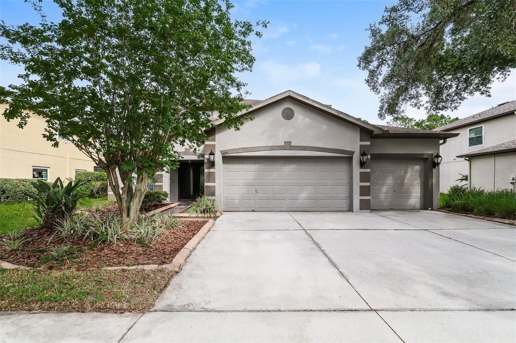 Photo of 14831 Heronglen Drive, Lithia, FL 33547 (MLS # TB8513410)