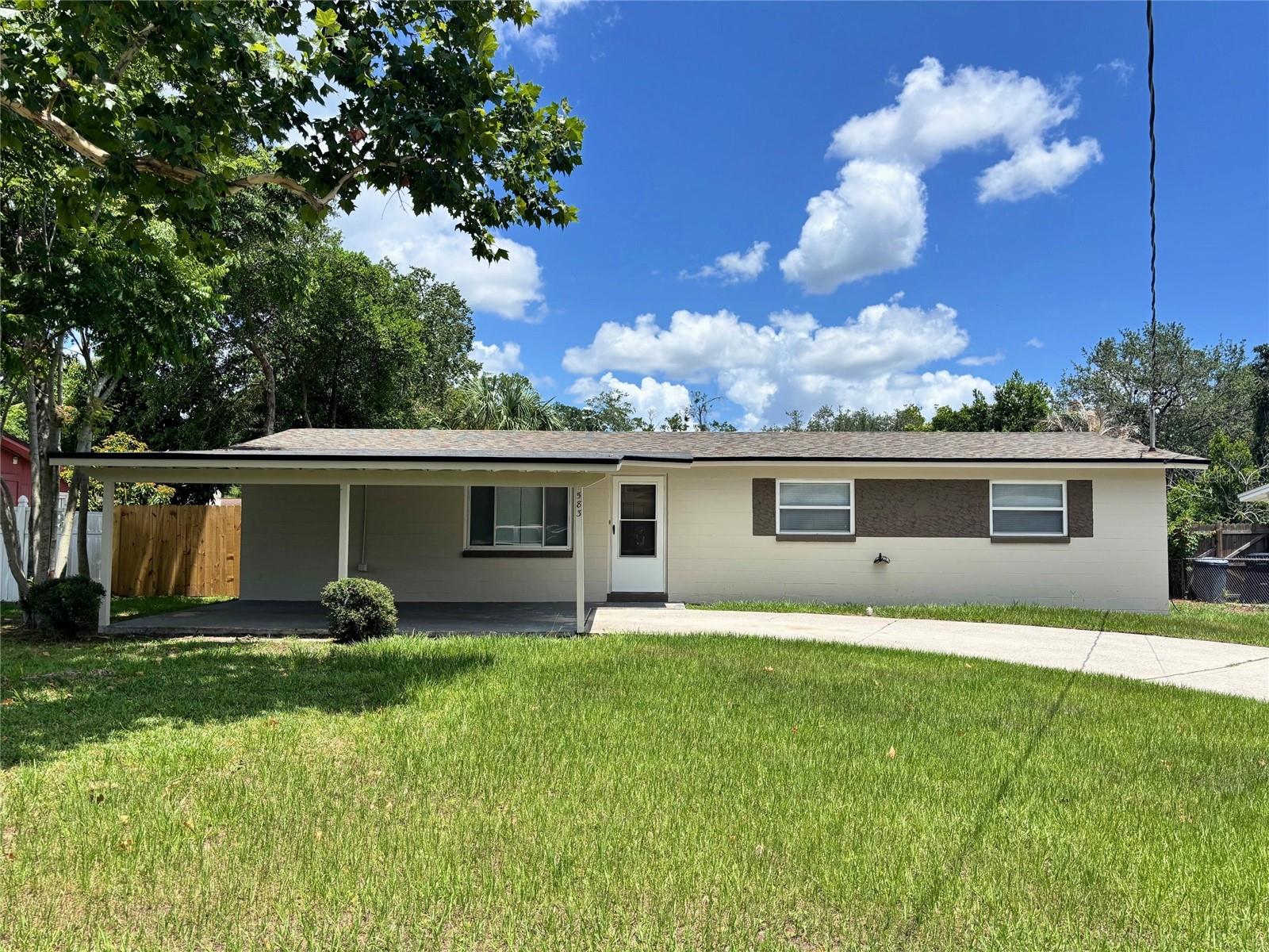 Adorable ranch home sits in the heart of Orange Park. This gracefully remodeled gem affords every luxury one could hope for! As you enter, you are immediately welcomed by the formal living room and dining room. The kitchen is a dream, replete with new shaker cabinets, granite countertops, all new stainless-steel appliances, and a breakfast bar. Just off the kitchen you'll find an inside laundry room that is more reminiscent of a butler's pantry, offering a well-placed dishwasher with more cabinets and counter space, and a new stackable washer/dryer to add to the functionality of the space. The family room is the heart of the home with beautifully exposed ceiling beams and big sliding glass doors from which natural light pours in and bathes the room in warmth - and lead to a fantastic, covered patio that's just the spot for some summer barbequing! The owner's suite is nicely sized with his & hers closets and ensuite bathroom. Two more inviting bedrooms with a fully remodeled guest bathroom are well suited within the home. New wood-style tile tastefully graces the whole home. New light fixtures, ceiling fans, new water heater. a roof that is only 7 years old and a fully fenced backyard round out a just a few more reasons you'll want to call this place HOME!