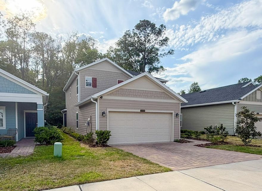 Exceptional *Newly-Built 2023, 2-Story Home* in the desired Tara Lane Community, just minutes from Santa Fe College North Campus & less than 6 miles from UF Campus. Spacious, great room with easy-maintenance, wood-looking ceramic tile floors throughout the living room, kitchen, and bathroom areas. The kitchen features quartz-topped countertops, stainless steel appliances, ample cabinet storage, and a large pantry. The versatile island doubles as a breakfast bar and food preparation station, while the screened-in patio just off the dedicated dining nook is perfect for outdoor relaxation without the bugs. The downstairs bedroom is flexible for an office or guest bedroom, making this home great for every generation to enjoy. The upstairs owner's suite features a large walk-in shower, a dual-vanity sink, a water closet, and a large master closet. Bedrooms 3 and 4 share a Jack & Jill full bathroom featuring a dual-vanity sink, optimizing prep space.  Includes an upstairs utility room with a new washer/dryer. This is a close-knit, small, 20-home community perfect for those seeking serene living in the city. The community offers a reading bench, a secluded walking trail, and a dedicated swingset for fun in the sun. Most residents enjoy the nearest amenities, just 10 minutes away at the popular Gainesville Health and Fitness or Albert "Ray" Massey Park.

HOA DUES: $70/Month
SCHOOL ZONES: Hidden Oak Elementary School, Fort Clarke Middle School, Buchholz High School 
INSURANCE: No Flood Insurance required
FEATURES: Integrated Ring Security, Smart Water Protection, and Energy Efficiency
(Devices managed through the Ring App)
- Built-In Ring Alarm/Security System with sensors, keypad, video doorbell, and smoke/CO alerts
- Flo by Moen Smart Water Monitoring and Automatic Shut-Off for Leak Protection
- Integrated Smart Thermostat, Smart Lock, and Home Networking Infrastructure
