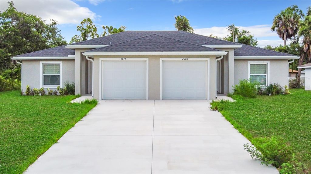 Photo of 2080 Redmond Street, Port Charlotte, FL 33948 (MLS # OM707802)