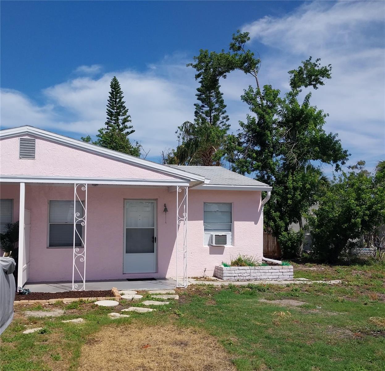 BEACHSIDE VILLA! only 5 BLOCKS TO BEACH! Quaint 1BR/1BA with spacious screened porch overlooking tropical backyard. Big corner lot! Easy parking! Ceramic tile, new paint. Kitchen has mini range/oven, new fridge. Newer windows. Bedroom fits KING bed. New AC window units. Owner uses the west side villa periodically when in town. Very private and quiet area with lots of yard space in front & back. Front porch & rear patio great for BBQs. Backyard has room store bikes, kayaks. Rent $1800/mo includes: Water/Sewer, Trash, Landscaping, Pest control. Washer/dryer hook up on screened porch - bring your own W/D extra $50 month for water/sewer use. ONLY 3 blocks away is ELKS CLUB with waterfront pool, boat docks, clubhouse & activities. Join for small annual fee. Enjoy Madeira Beach's small beach town atmosphere with many great features like a Municipal Marina, Dog park, tennis/racquetball courts, basket ball, baseball fields, public fishing pier, waterfront park with kids splash pad, fun activities and concerts! WALK/BIKE RIDE TO SPARKLING MADEIRA BEACH! CONVENIENT PUBLIC ACCESS! Pet friendly CATS ONLY! Close to shopping, schools, VA Hospital, restaurants, Johns Pass! TO MOVE IN: need 1st, last & 1 month security deposit (refundable). Tenant Background criminal & credit check approx. $110.(Rooms sizes are approx. - tenant to verify) Departure clean fee $200