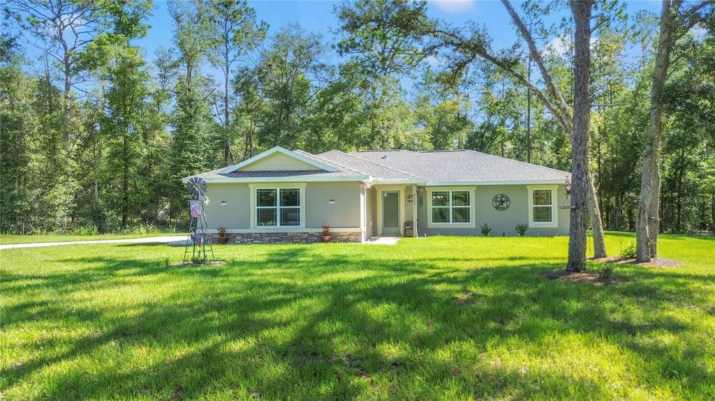 Photo of 9535 N Aquarius Drive, Dunnellon, FL 34434 (MLS # OM708341)