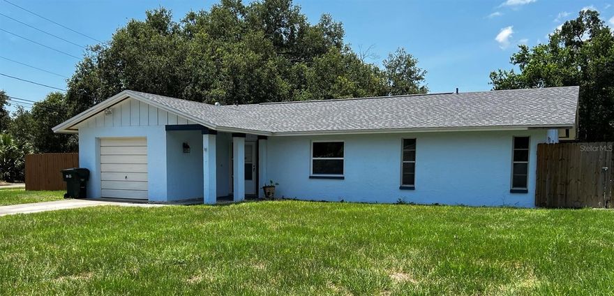 Welcome to this meticulously maintained and fully renovated 3-bedroom, 2-bathroom Clearwater residence in the desirable Highland Manor development.  This property has never flooded and is above the 500 year flood plane!  The recent and extensive high-quality remodeling upgrades cost in excess of $80,000 and include hurricane impact insulated windows and sliding glass door assuring impact safety and thermal efficiency.  Superior quality soft-close kitchen cabinets with granite countertops, granite kitchen bar for serving or eating meals, premium stainless steel kitchen appliances, vent hood and garbage disposal.  Superior quality bath cabinets & granite countertops.  Premium quality dimensional shingle roof and energy efficient air conditioning system.  New tub and tile in guest bathroom.  Neutral interior painting throughout. Attractive and very functional laminate flooring in the living area and bedrooms, quality ceramic tile in the kitchen and bathrooms, quality plantation shutters on all but bathroom windows. Completing the home is your very large (nearly 1/3 acre) fully fenced, shaded and private backyard, which has plenty of room for a pool.  Future building options, if you please, could include a large new master suite addition.  You could also add a new two or three car garage and convert the existing garage to a large fourth bedroom and third bathroom as a second master suite.  Seabreeze Street was very recently repaved and is in excellent condition.  Lovely neighborhood and very pleasant neighbors.  Great value at this price for a beautiful fully renovated home as is, with excellent options to make it a larger and even more attractive and valuable estate!  No HOA fees.  This Seabreeze property is a great purchase opportunity for you and is priced to sell quickly.  (Neighboring homes immediately abutting this Seabreeze property are presently priced for sale for more than $839,000 and $919,000 each.)