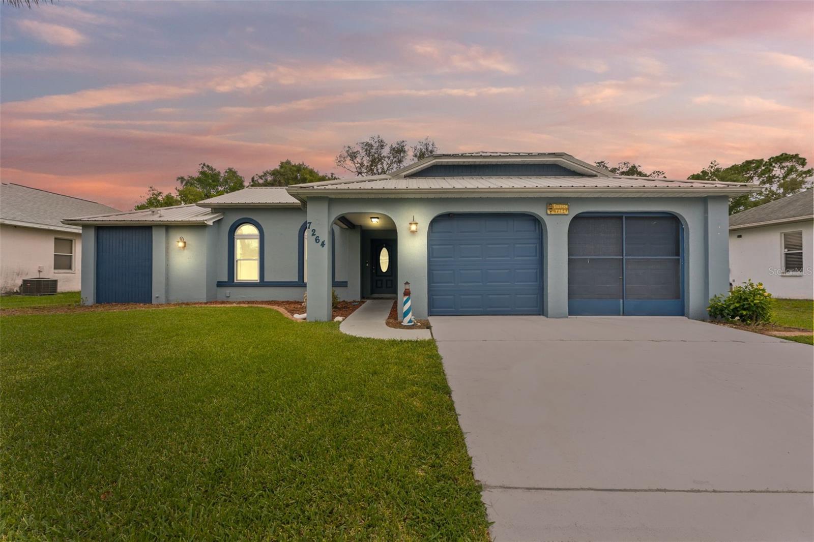 Seller offering a 1% lender credit toward closing costs with preferred lender on this beautifully maintained pool home in the sought-after Regency Oaks community. This 4-bedroom, 2-bath property features a long-lasting metal roof, energy-efficient newer windows, and an updated HVAC system for year-round comfort. The open split floor plan welcomes you with vaulted ceilings, abundant natural light, and a seamless flow between living spaces. The kitchen offers stainless steel appliances, ample cabinetry, and a breakfast bar that opens to the family room, perfect for gatherings. The spacious primary suite includes a walk-in closet and a private bath with dual sinks, soaking tub, and separate shower, while additional bedrooms are generously sized and share an updated guest bath. Step outside to your private backyard retreat with a screened lanai, sparkling in-ground pool, and tropical landscaping, with a fenced yard offering privacy and space for outdoor activities or pets. Tile and laminate flooring throughout provide easy maintenance, while the formal dining area, inside laundry, and two-car garage add convenience. Located minutes from shopping, dining, Weeki Wachee Springs, and the Suncoast Parkway for an easy Tampa commute.