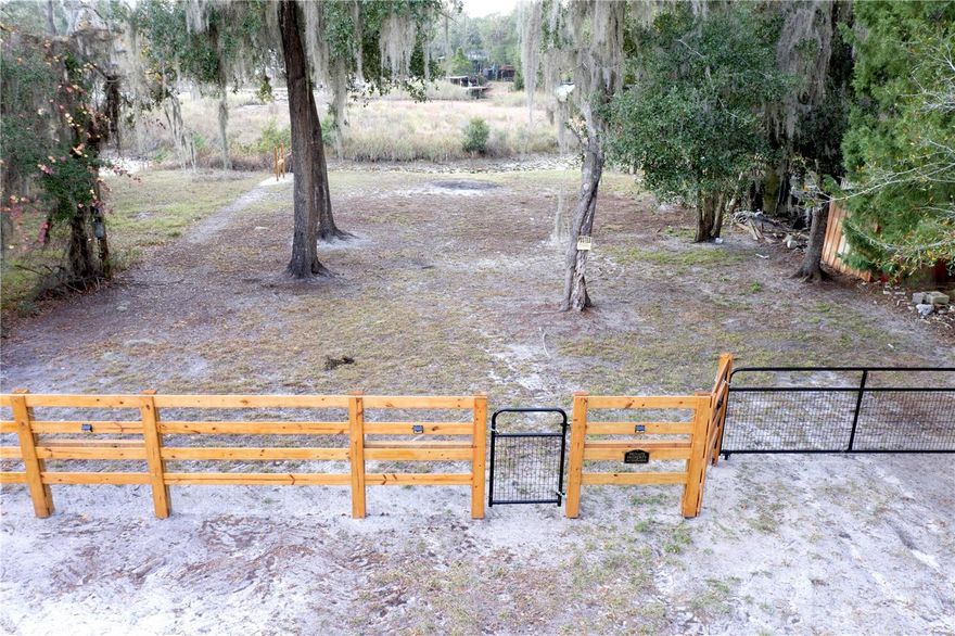 Canal waterfront property is .16 acres with R-4(Residential) zoning and leads to Little lake Kerr and short boat ride to Lake Kerr. The lot is mostly cleared and ready for your new home. Beautiful lot includes 60' of frontage with wood/wire fencing, entry gate and vehicle gate. Mostly cleared with a few large trees. Water level is low at this time but always comes back. Located in the heart of the Ocala National Forest w/ beautiful Salt Springs swim area, boat launch and short ride to Lake George and the St. Johns River. Salt Springs is also home to miles and miles of ATV/SxS, Horseback and hiking trails. Great fishing year round in the many lakes, rivers and forest ponds, and don't forget about the excellent hunting too. Close to local shopping including grocery store, Dollar General, hardware, gas station, great restaurants, entertainment and more. Only short 30 minute drive to Ocala or Palatka for all your needs.