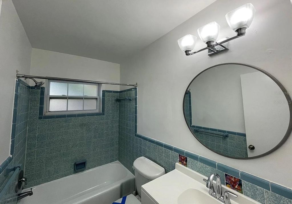 Photo of 1211 S Lake Drive, Clearwater, FL 33756 (MLS # TB8483765)