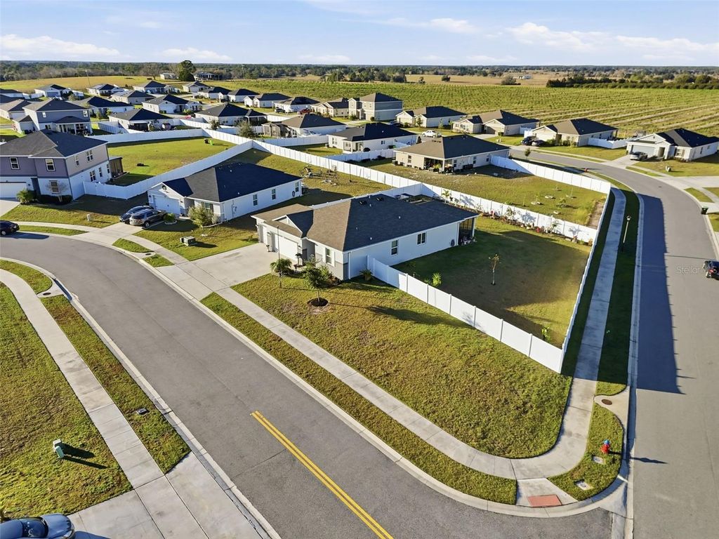 Photo of 2201 Gladiolus Ln, Mascotte, FL 34753 (MLS # TB8465859)