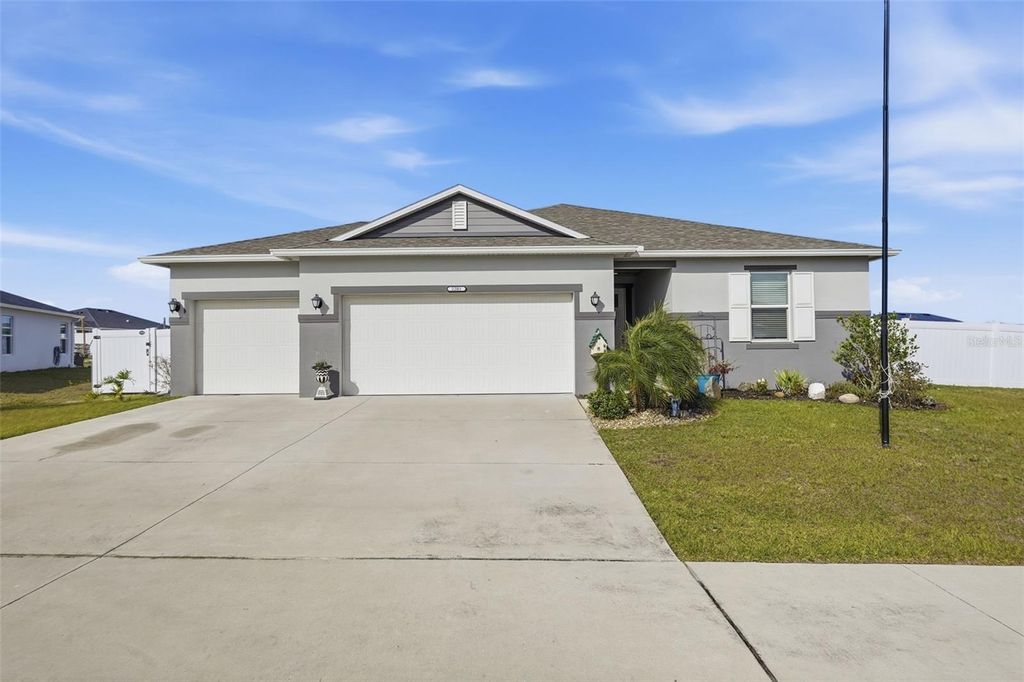 Photo of 2201 Gladiolus Ln, Mascotte, FL 34753 (MLS # TB8465859)