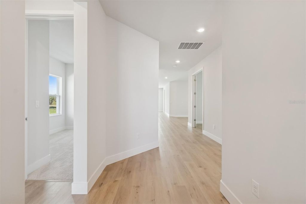 Photo of 10660 Crescent Creek Crossing, Parrish, FL 34219 (MLS # TB8478310)