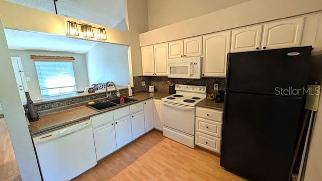 Photo of 10343 Riva Ridge Trail, Orlando, FL 32817 (MLS # O6352048)