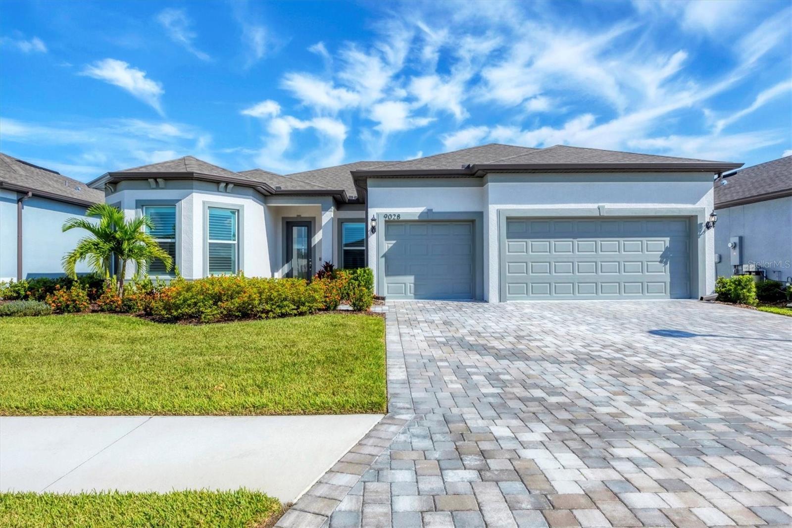 A STELLAR opportunity in the Sunray Cove area of Del Webb Bay View offers expansive views of gently flowing water. This floorplan presents three very separate bedrooms, three full baths, an over-sized den/office, and the high demand open floor plan with a chef’s kitchen, gathering room and café. Kitchen features gas KitchenAid appliances and is replete with a wine enthusiast’s cooler. This home has impact glass windows and doors for peace of mind (including the zero corner sliders to the lanai). Speaking of the lanai, it is pre-plumbed for an outdoor kitchen and has a remote-controlled wind screen. All rooms have ceiling fans and remote-controlled window treatments. Do note this Stellar home can convey exactly as shown with top tier furnishings if desired. Also note that all warranties are in place. The Bay View community is a 55+ community that is as active as you want it to be! Located within 1.5 miles of I-75 and 275, getting anywhere is easy.
