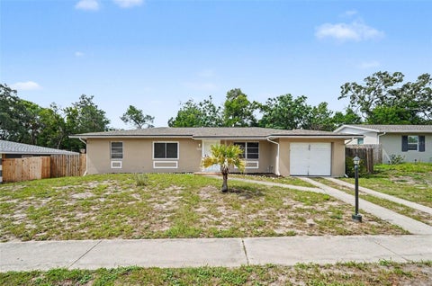 Photo of 7170 Holiday Drive, Spring Hill, FL 34606 (MLS # O6426835)