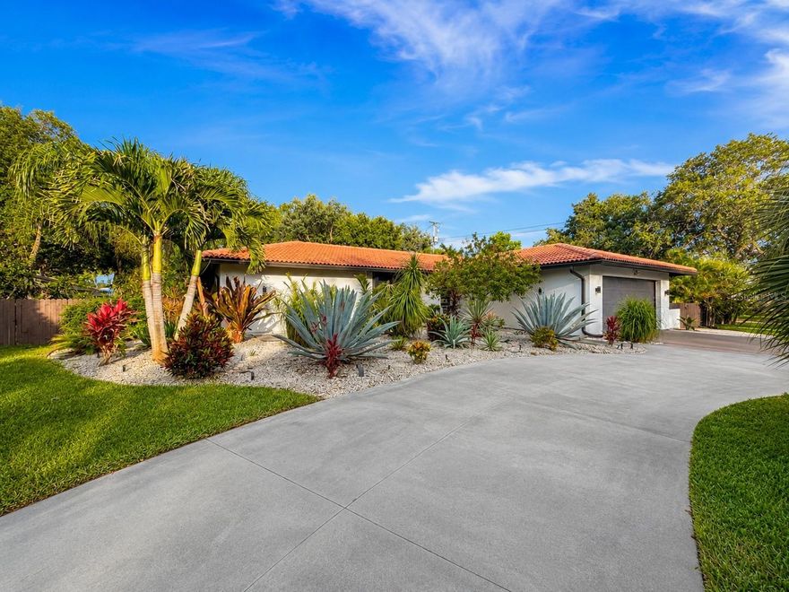 This stunning Nokomis pool home blends modern luxury with exceptional Florida living. Nestled on a beautifully landscaped lot with mature tropical greenery, this property offers privacy, style, and functionality throughout. The open-concept interior features designer finishes, a show-stopping chef’s kitchen, spa-inspired bathrooms, and high-end upgrades from top to bottom. Step outside to your private backyard retreat with an expansive outdoor living area, oversized 8-foot deep heated saltwater pool, screened lanai, and fully fenced yard—perfect for entertaining, relaxing, or enjoying year-round coastal living. Low HOA, no CDD fees, and access to highly rated schools with convenient neighborhood bus transportation make this beautifully updated property an exceptional choice for both families and long-term value. A rare turnkey opportunity combining sophisticated indoor updates with incredible outdoor amenities in one of Nokomis’ most desirable locations. Conveniently located near Nokomis Beach, shopping, dining, and top-rated schools, this beautifully remodeled property offers easy access to both Sarasota and Venice.