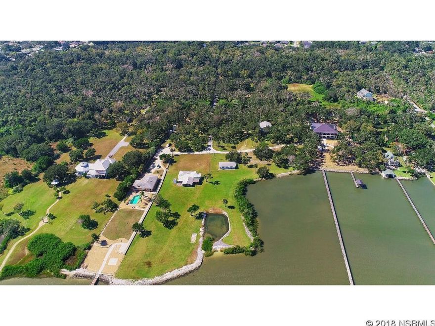 There's a spot on the river in South East Volusia County that has been home to world famous oysters for the last 69 years. Through it's cuisine, atmosphere and history Packwood's Place became a Florida jewel.  Spain deeded this land in 1803 â one of the areas first land grants. My grandparents met there in 1949. I've eaten there with family. Situated on 19+/- Acres with approx 300 FT DIRECTLY on the DEEP ICW Intracoastal Wateray) This once in a lifetime experience with nature in Edgewater Florida just south of New Smyrna Beach will enchant you and you will never want to leave.   This acreage housed a fishing camp, a shell quarry (the shell sold all over Florida in the late 1800s and early 1900s to make roads all over Florida), the location of a raid by Natives, and the resting place of a number of the early settling families that made it their home. If you are ready to live back in time yet minutes from town; don't hesitate to call your REALTOR today!  Currently in the county; easy to annex into City of EW.  Seller is carving out the homestead property of approx 1 acre with apex 80 ft on the ICW; Cleared: Partial ;Water: Available at Site