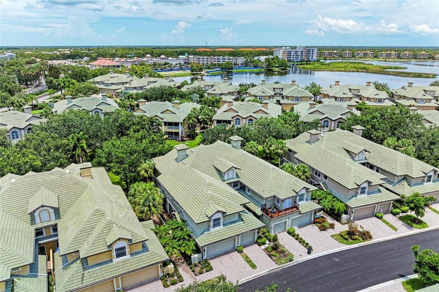 The Moorings at Edgewater Village is a gated community and is within walking distance to four separate town centers featuring over twenty restaurants, craft-style pubs, cinema, mini-golf, hospital, medical centers and a grocery stores.  And, with University Town Center only 5 minutes away, the entertainment and shopping options are simply unmatched! This first-floor 3-bedroom, 2-bathroom coach home with 1-car garage has been completely transformed.  The entire property has been updated with new tile flooring throughout. The large great room has an expanded pass through to the kitchen and offers plenty of room for entertaining friends and family while overlooking peaceful views of the gardens. The kitchen has been completely redesigned, equipped with quartz countertops, stainless steel appliances, wine fridge, and a breakfast nook overlooking a paver lanai. The owner's suite with ensuite bathroom has been meticulously updated with a walk-in shower stall, new dual sink vanity and walk-in closet.  The 2 additional bedrooms have their own separate lanai area and share the second bath which has also been entirely remodeled and includes a spa tub/shower.  The unit also has a central vacuum for ease of cleaning. NEW ROOF IN 2021! The Moorings offers a clubhouse with fitness center, catering kitchen, billiards table, library, meeting space with Wi-Fi and entertainment area, showers and lockers, pool and hot tub, and outdoor grill. Sitting on the 153-acre Lake Uihlein, The Moorings offers fishing, non-motorized boating, and social gathering spaces on the private island accessible via a long boardwalk. The award-winning master-planned community of Lakewood Ranch offers a plethora of golf, tennis, pickleball, and public park options and is less than 30 minutes from SRQ Airport, Downtown Sarasota, St. Armands Circle, and several of Sarasota’s world-renowned beaches just minutes to I-75.